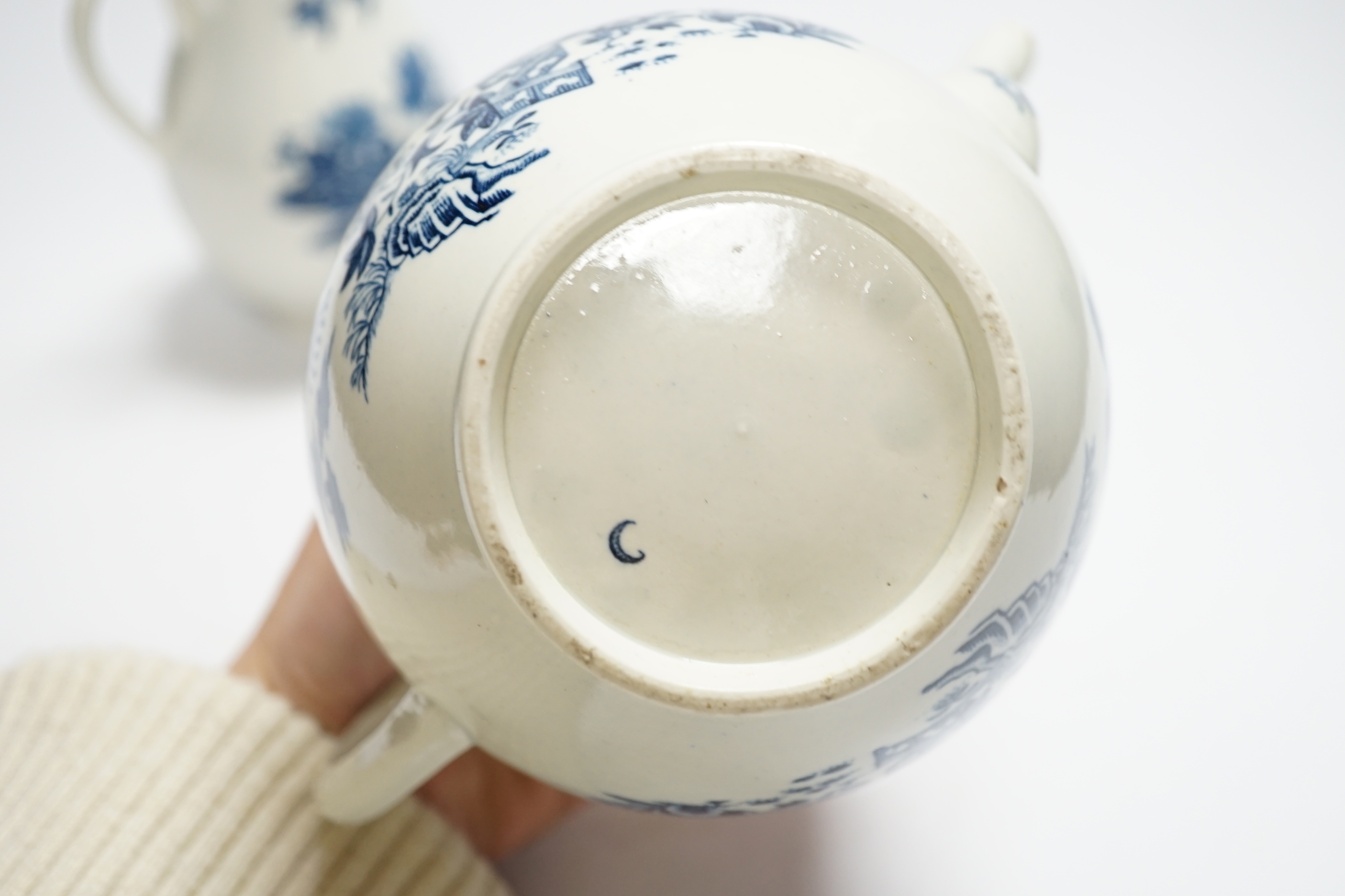 A Worcester fence pattern teapot and cover and a similar milk jug c.1775, largest 19cm wide